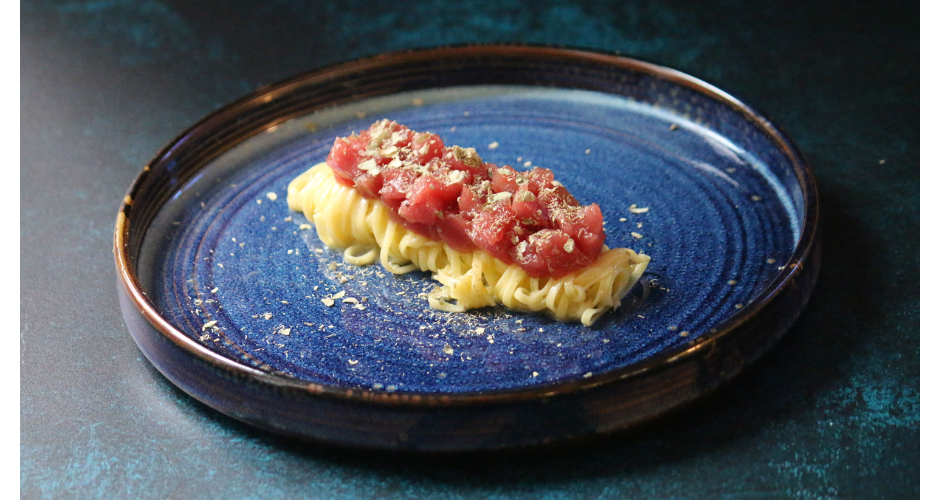 Pasta with fresh red tuna tartare and dehydrated capers